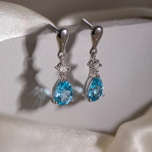 Pure Silver Pear Lab-Created Blue Topaz Dangle Earrings - Stylishever
